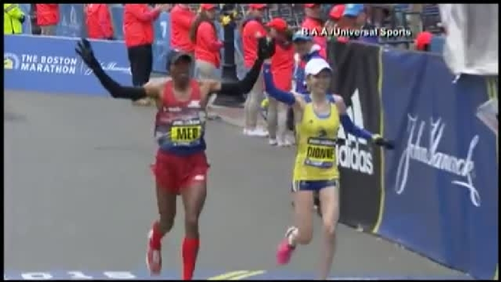 Elite runners hold hands as they cross marathon finish line WJAR