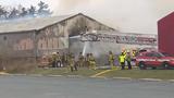 Firefighters battle flames at furniture warehouse on West Broad Street
