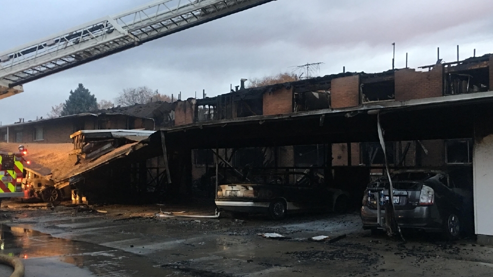 Dozens evacuated as flames rip through Murray condo complex KUTV