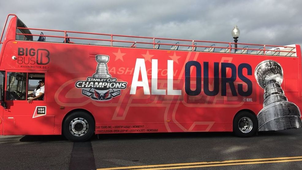 Capitals players riding 'ALL OURS' Stanley Cup buses in DC victory