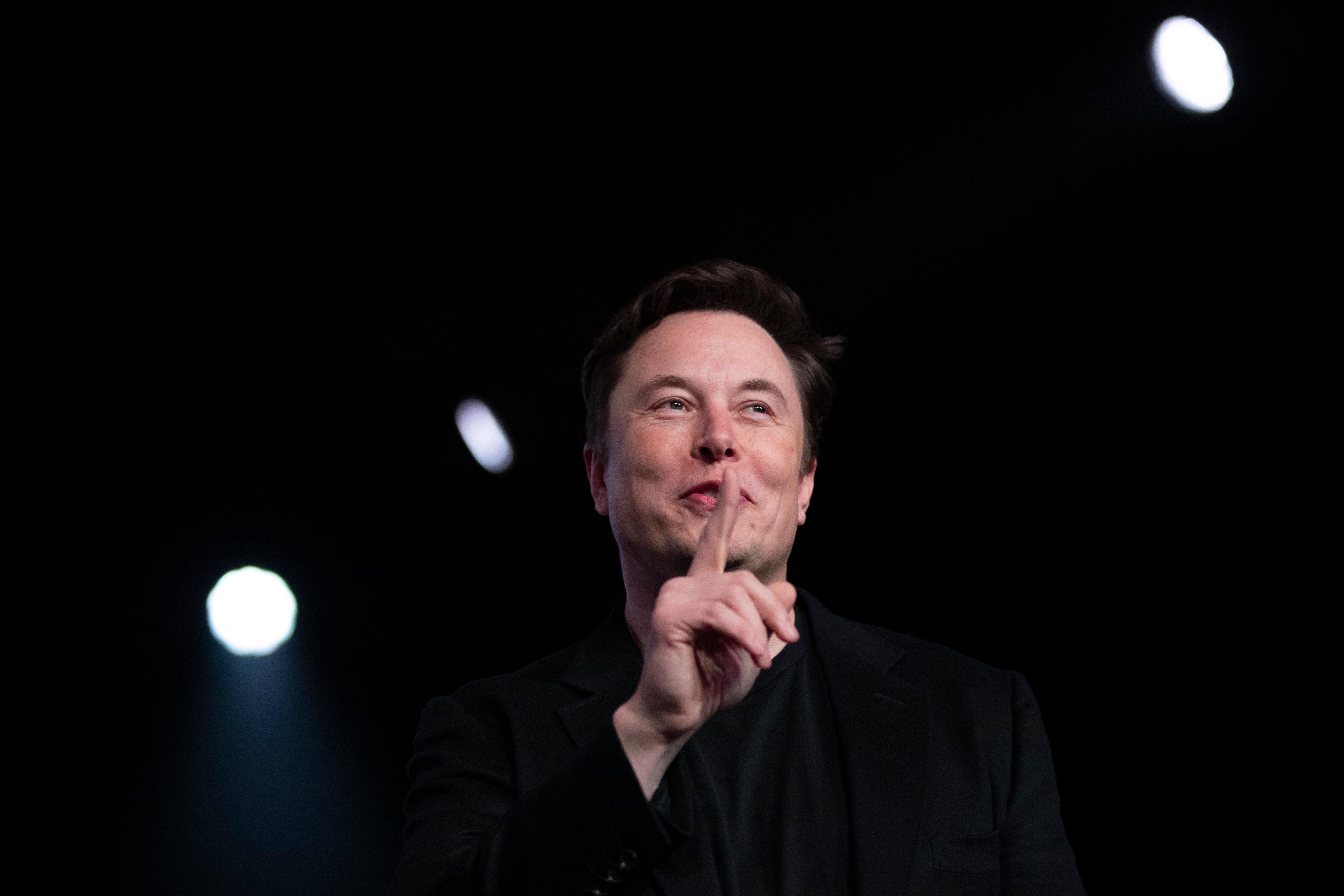 tesla ceo elon musk speaks before unveiling the model y at the